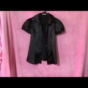 A satin black short sleeve dress shirt,